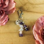 Sleutelhanger gouden driehoek met bedels nr. 2